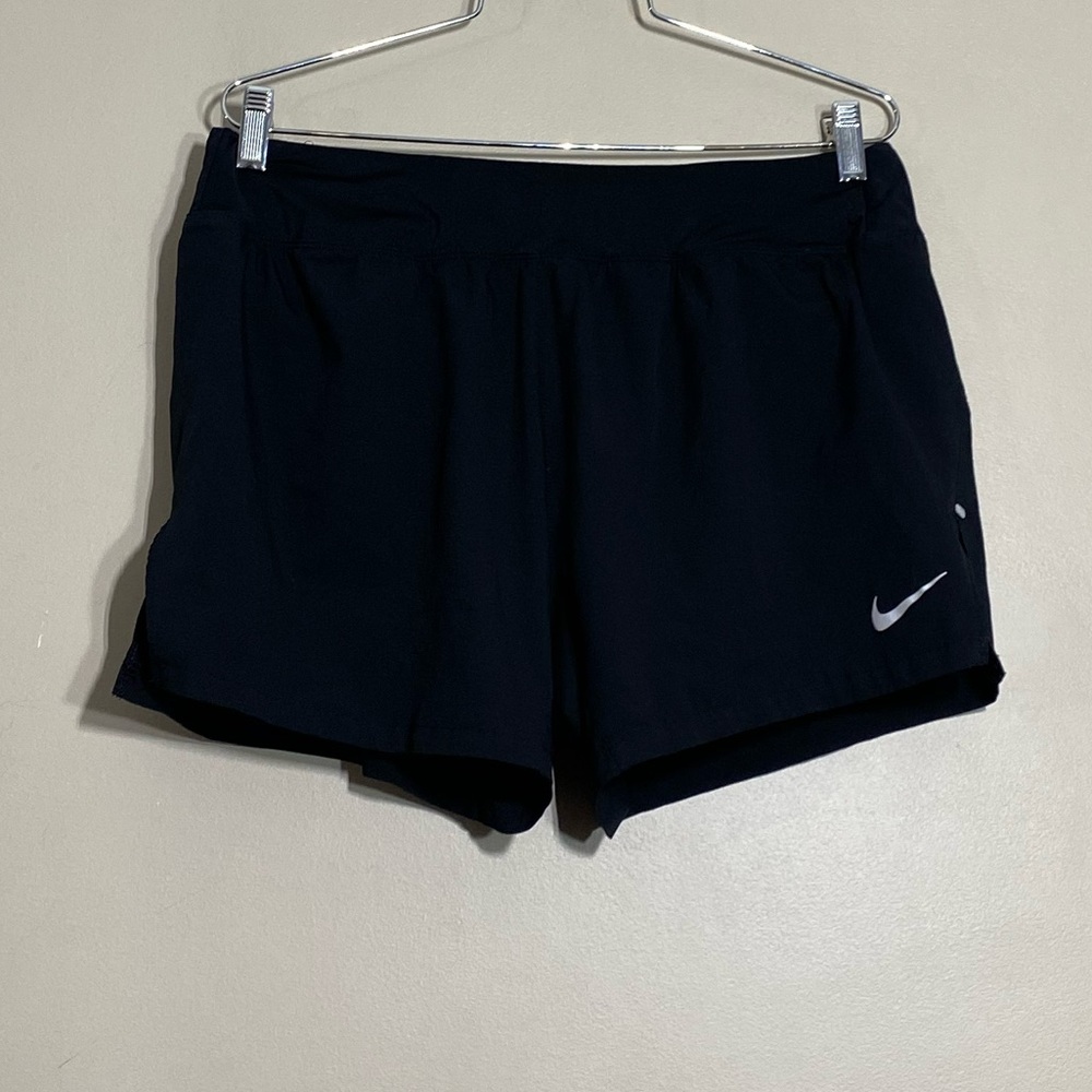 Nike Running sorts with inner underwear attached size large